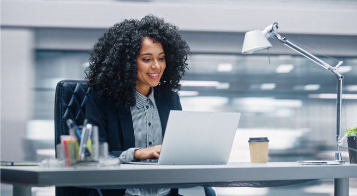A woman filing her taxes online.